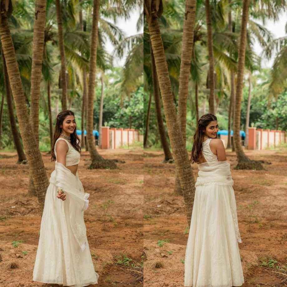 Pooja Hegde turns princess in coconut white minimal lehenga set [Photos] 877684