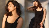 Style Goddess Alert: Shraddha Kapoor shines in all black high slit dress and boots 878362