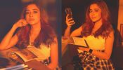 Tina Datta dolls up in white sleeveless top and checkered mini skirt