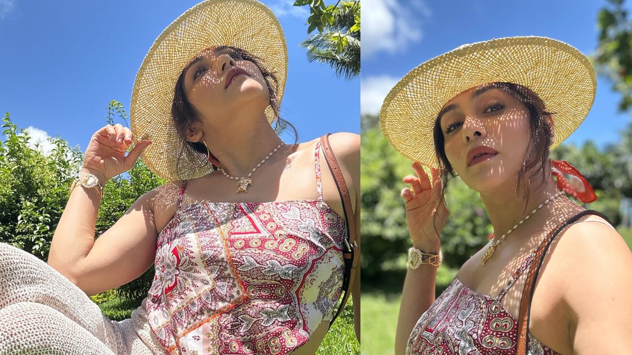 Vacay Goals: Amruta Khanvilkar Radiates Glow In Scarf Top, Flare Trouser & Sun Hat 878813