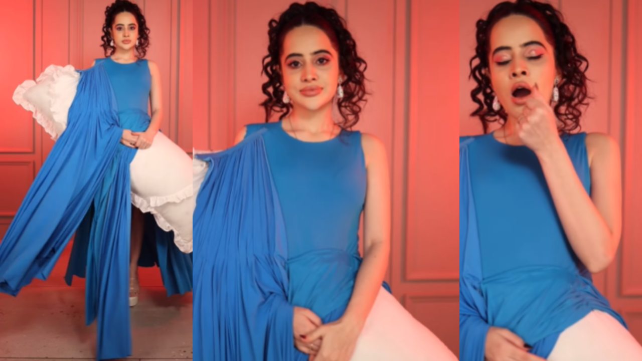 Urfi Javed shocks internet with pillow-enhanced blue dress, watch video