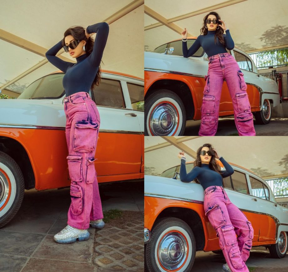 Chic Contrast: Nora Fatehi Nails Casual Style In A Blue Top And Pink-Blue Cargo Pants 889000