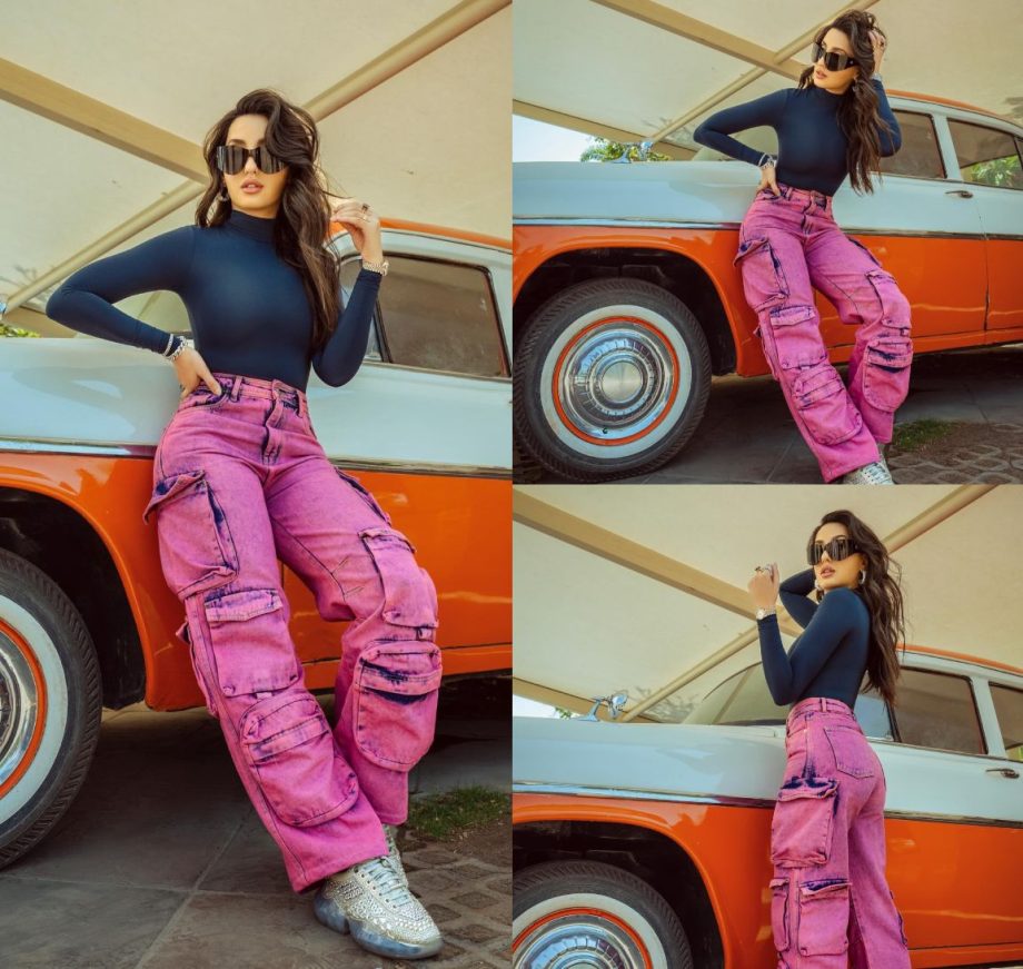 Chic Contrast: Nora Fatehi Nails Casual Style In A Blue Top And Pink-Blue Cargo Pants 889001