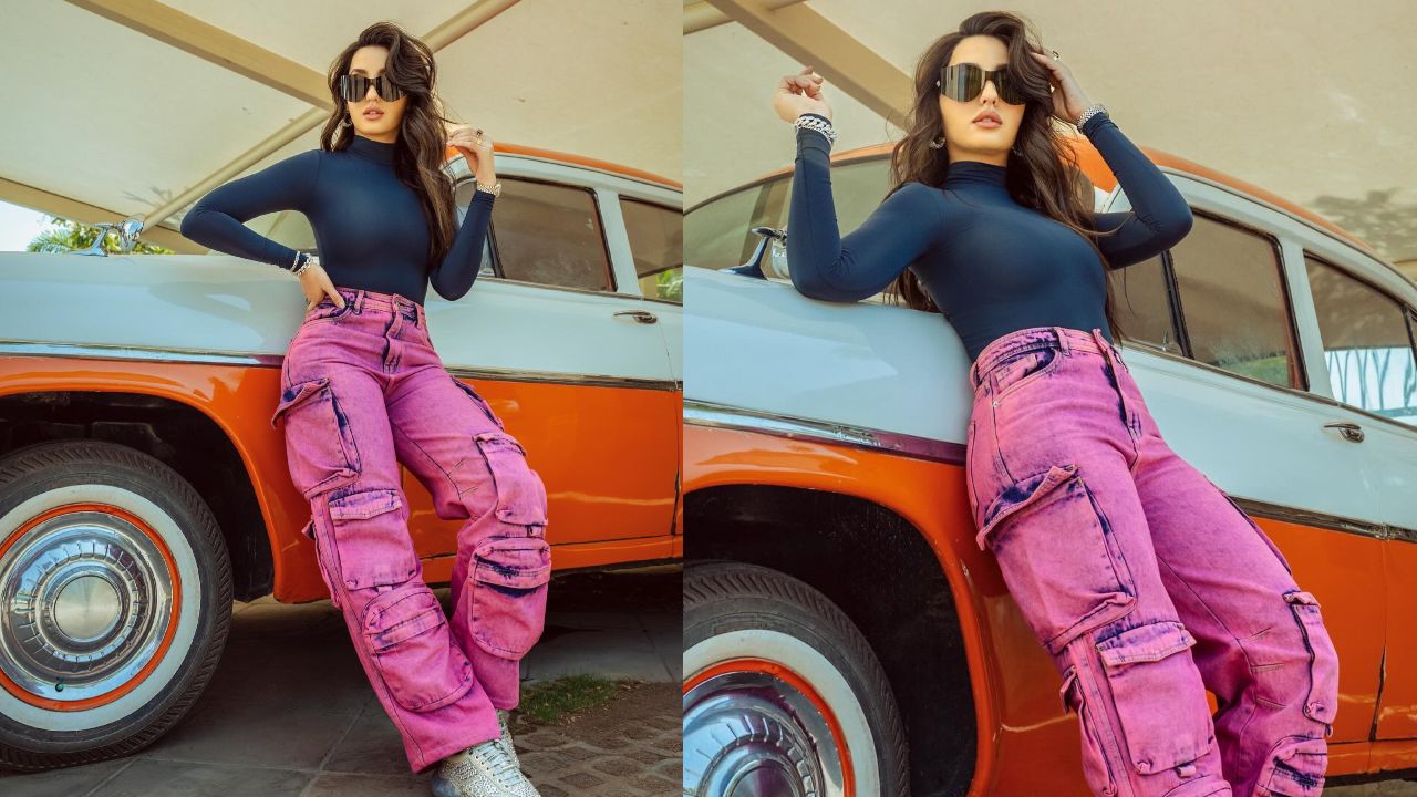 Chic Contrast: Nora Fatehi Nails Casual Style In A Blue Top And Pink-Blue Cargo Pants 888999