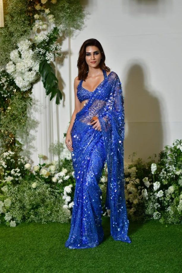 Fashion Showdown: Kriti Sanon vs. Deepika Padukone: Who Slayed In Blue Sequin Saree Better? 887313