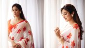 Janhvi Kapoor Takes Us Back In Time With Vintage Glamour In A White And Orange Floral Saree 886189