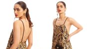 Manushi Chhillar Radiates Charm In A Black And Gold Dress; See Photos