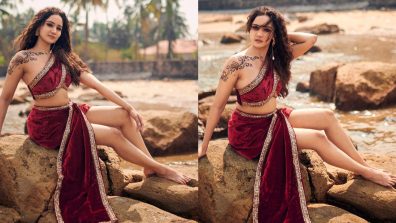 Ashi Singh Makes Waves Posing Hot On Rock Wearing Vintage One-shoulder Blouse & Mini-skirt