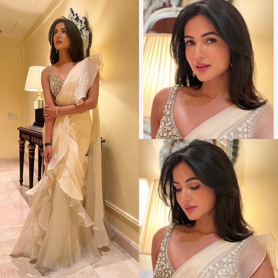 Breathtaking Beauty: Sonal Chauhan Channels Regal Vibes in an Ivory Ruffle Drape Saree with Beaded Bustier 893284
