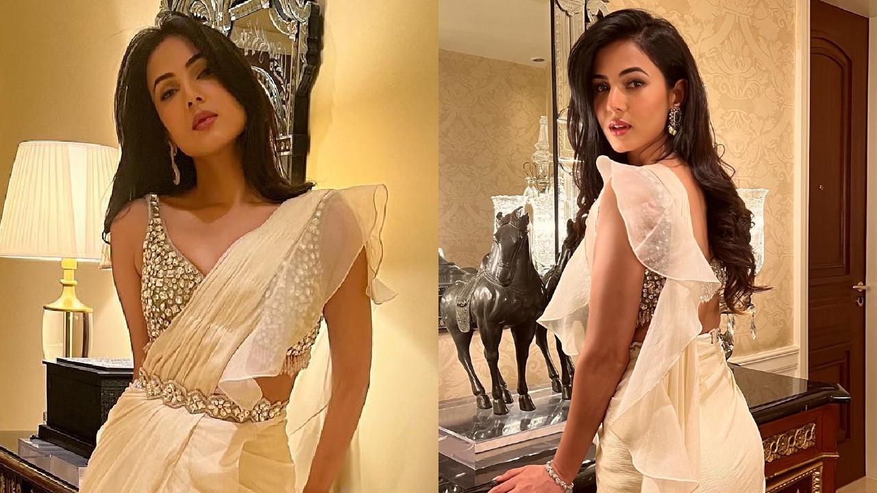Breathtaking Beauty: Sonal Chauhan Channels Regal Vibes in an Ivory Ruffle Drape Saree with Beaded Bustier 893285