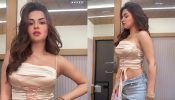 Casual Chic: Avneet Kaur Rocks in a Pink Crop Top and Blue Unbuttoned Jeans, Flaunting Toned Midriff! 893279