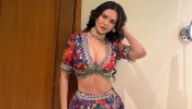 Esha Gupta looks Hot in a Plunging neck Blouse and Multicolored Lehenga Set; check out these photos!