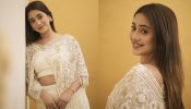Ethereal Charm: Shivangi Joshi Graces The Occasion In An Ivory Lehenga With Floral Cloak 890739