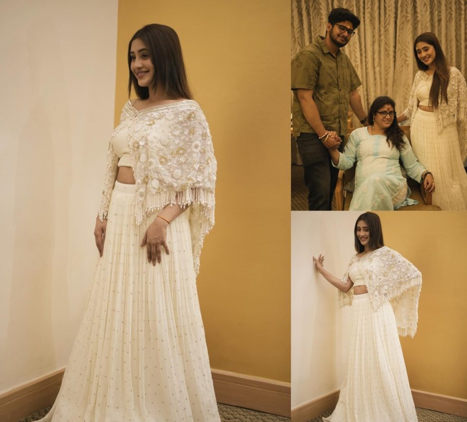 Ethereal Charm: Shivangi Joshi Graces The Occasion In An Ivory Lehenga With Floral Cloak 890740