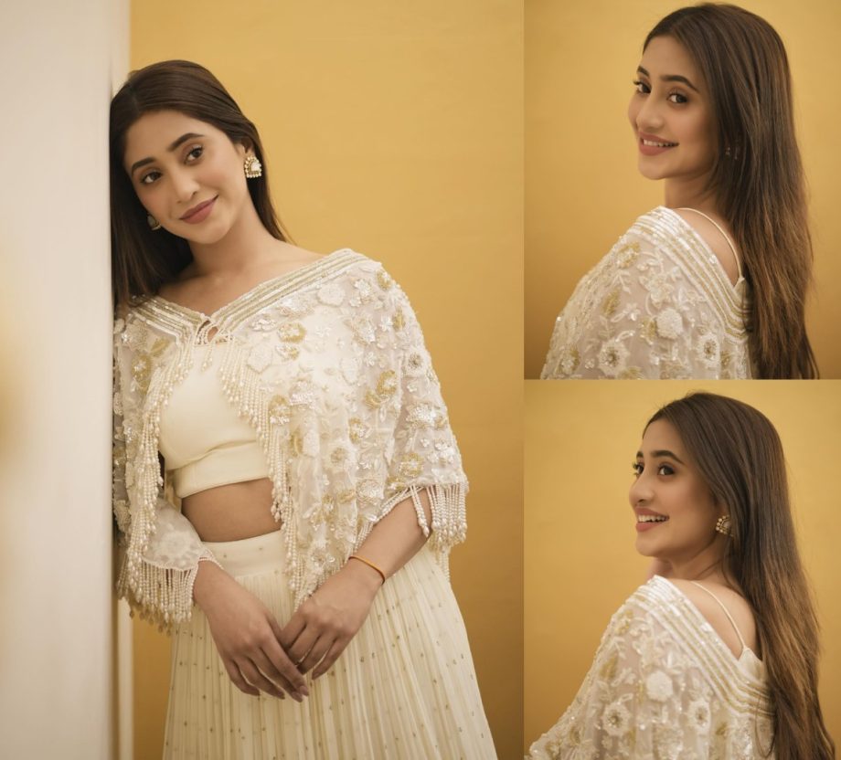 Ethereal Charm: Shivangi Joshi Graces The Occasion In An Ivory Lehenga With Floral Cloak 890741