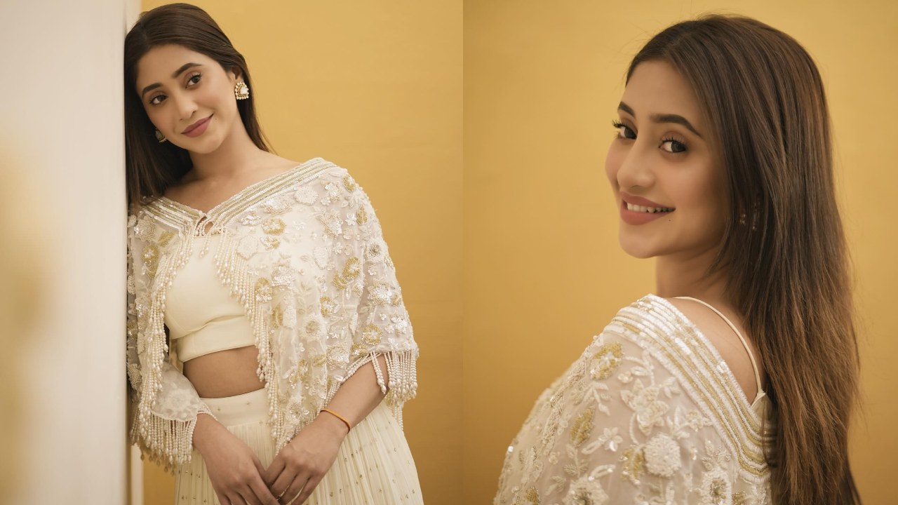 Ethereal Charm: Shivangi Joshi Graces The Occasion In An Ivory Lehenga With Floral Cloak 890739