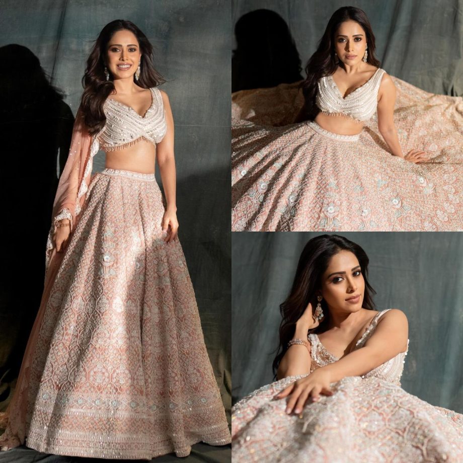 Glamorous Beauty: Nushrratt Bharuccha Radiates Elegance in an Ethereal Pink Bridal Lehenga Set 893219