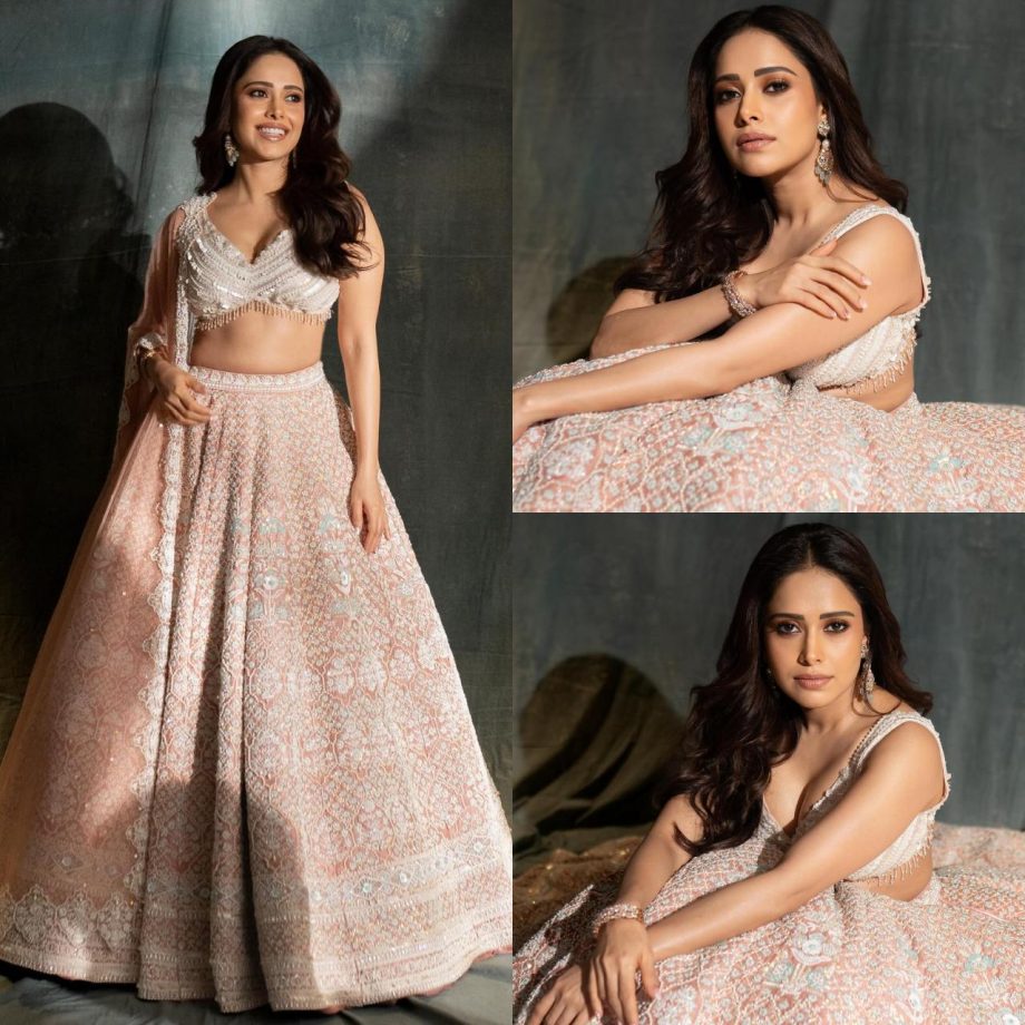 Glamorous Beauty: Nushrratt Bharuccha Radiates Elegance in an Ethereal Pink Bridal Lehenga Set 893220