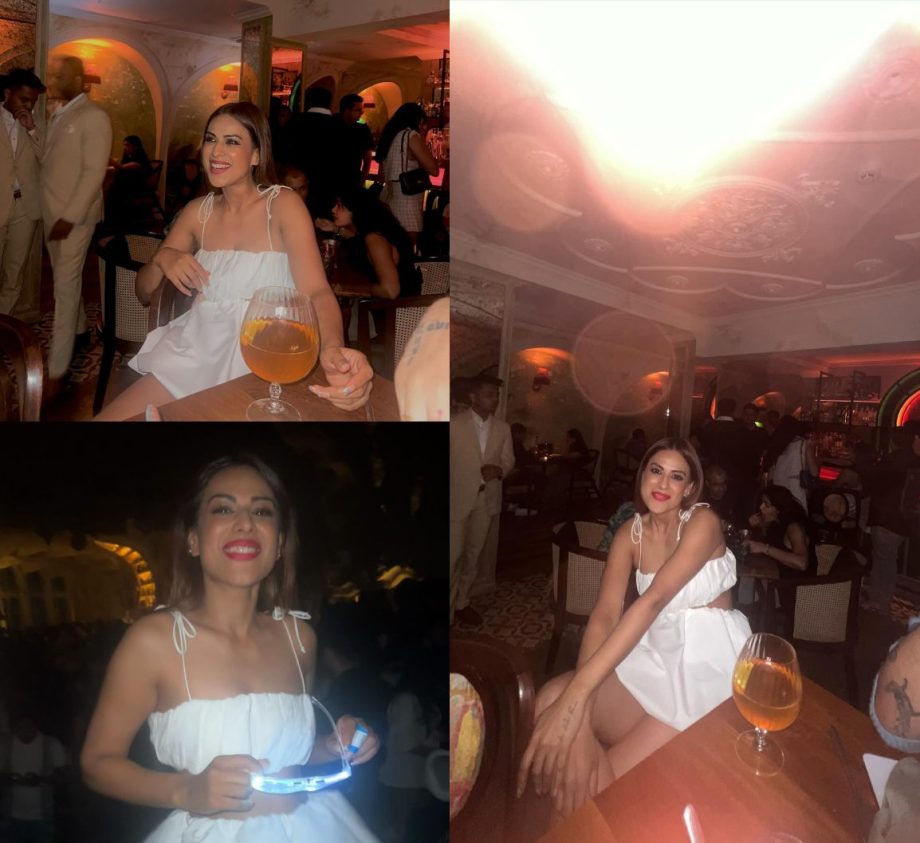 Nia Sharma Rocks Saturday Night in a White Spaghetti Frill Top & Matching Skirt; Arjun Biljani Says, 