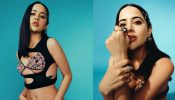 Urfi Javed Makes A Bold Fashion Statement In A Printed Bralette, Black Cut-out Top And Mini Skirt