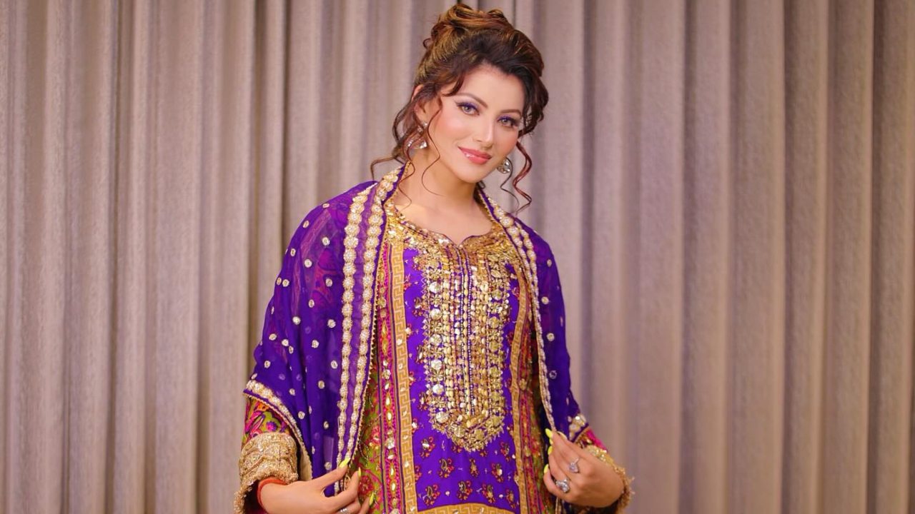 Urvashi Rautela Flaunts Her Flawless Style in a Regal Purple Heavy Work Kurta Set 892210