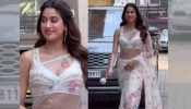 Janhvi Kapoor Flaunts Her Elegance in a White Floral Saree with Cricket Ball Themed-Bag 895179