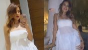 Suhagan Chudail Nia Sharma Stuns In White One-piece Dress With Bold Red Lips, See Photos