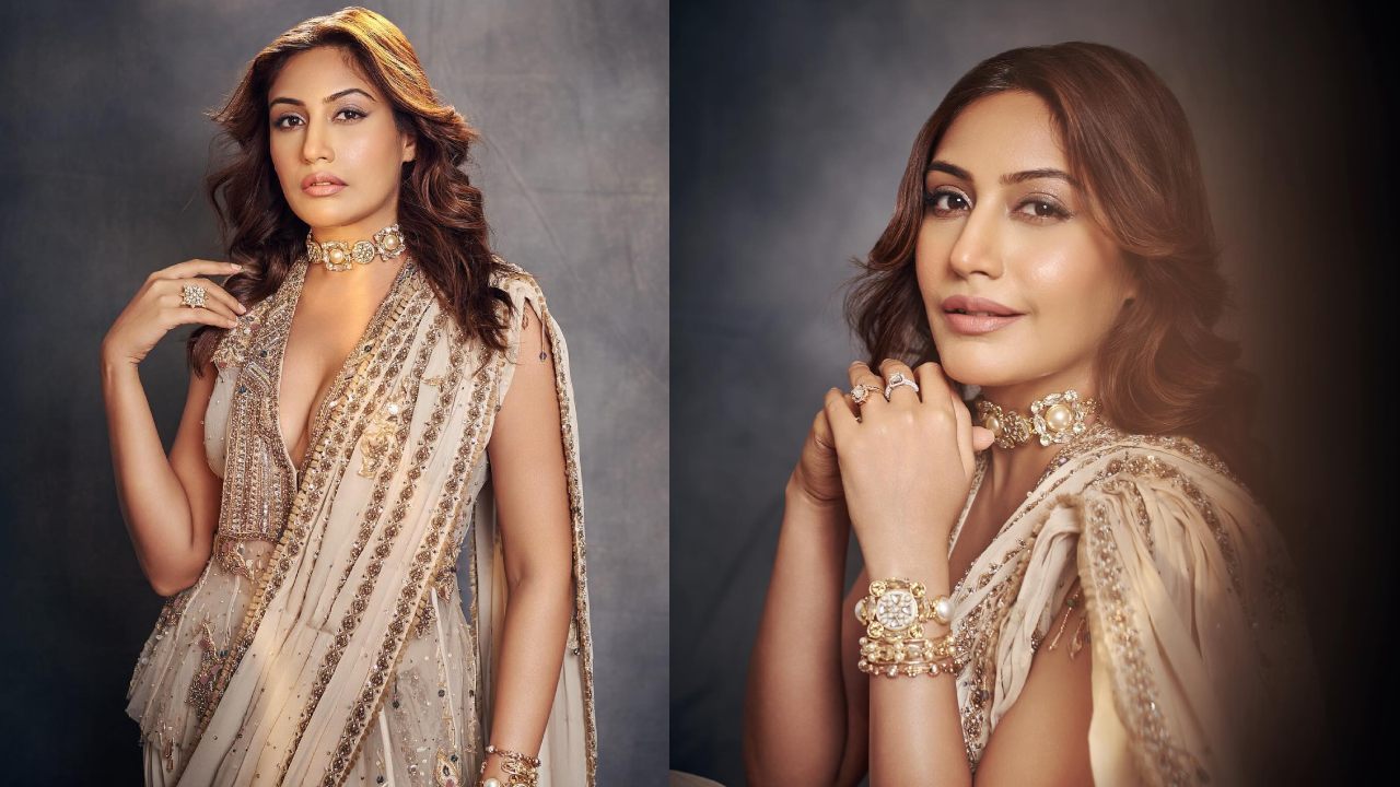 Surbhi Chandna Looks Gorgeous in a Stylish Ivory Saree with a Plunging Neckline Blouse 895330