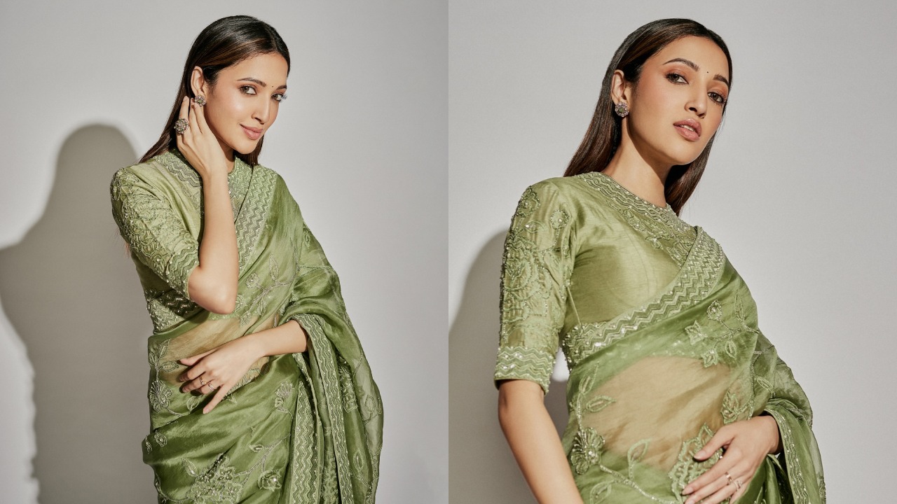 [Photos] Neha Shetty Looks Divine In Green Saree With High-Neck Blouse 900397