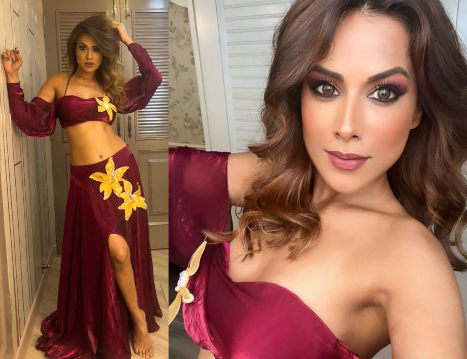 Suhagan Chudail Actress Nia Sharma Stuns In Silk Maroon Blouse And Slit Skirt 898513