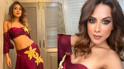 Suhagan Chudail Actress Nia Sharma Stuns In Silk Maroon Blouse And Slit Skirt