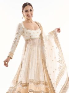 Kiara Advani Redefines Glamour In Classic Off-White and Gold Silk Anarkali Set