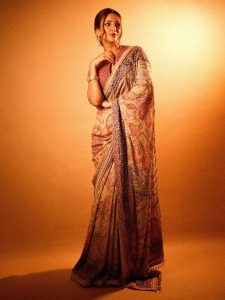 Triptii Dimri Exudes Vintage Vibes In A Beige Floral Saree Paired With A Red Blouse