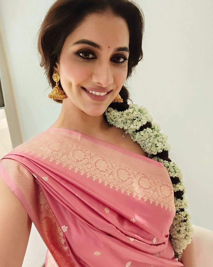 Rukmini Maitra's Traditional Chic: Pink Saree and Gajra Braids 919634