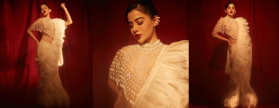 Urfi Javed Sizzles in Pearl Blouse and Feather Pallu, Stealing the Spotlight with Her Dazzling New Look 923437