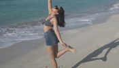 Reem Shaikh Slays Beach Fashion In Denim Short And Striped Bralette Top With A Chic Cowhat
