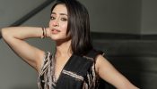 Shivangi Joshi Looks Like a Diva in a Black Draped Saree with Leaf Print Blouse