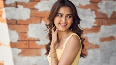 Tejasswi Prakash Stuns in a Fitted Yellow Dress with Flare