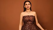 Aditi Rao Hydari Shines in an Elegant Off-Shoulder Brown Dress 944010