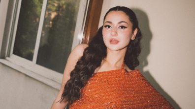 Hania Aamir Screams Attention In Shimmery Tangerine Fishtail Gown – See Stunning Pics