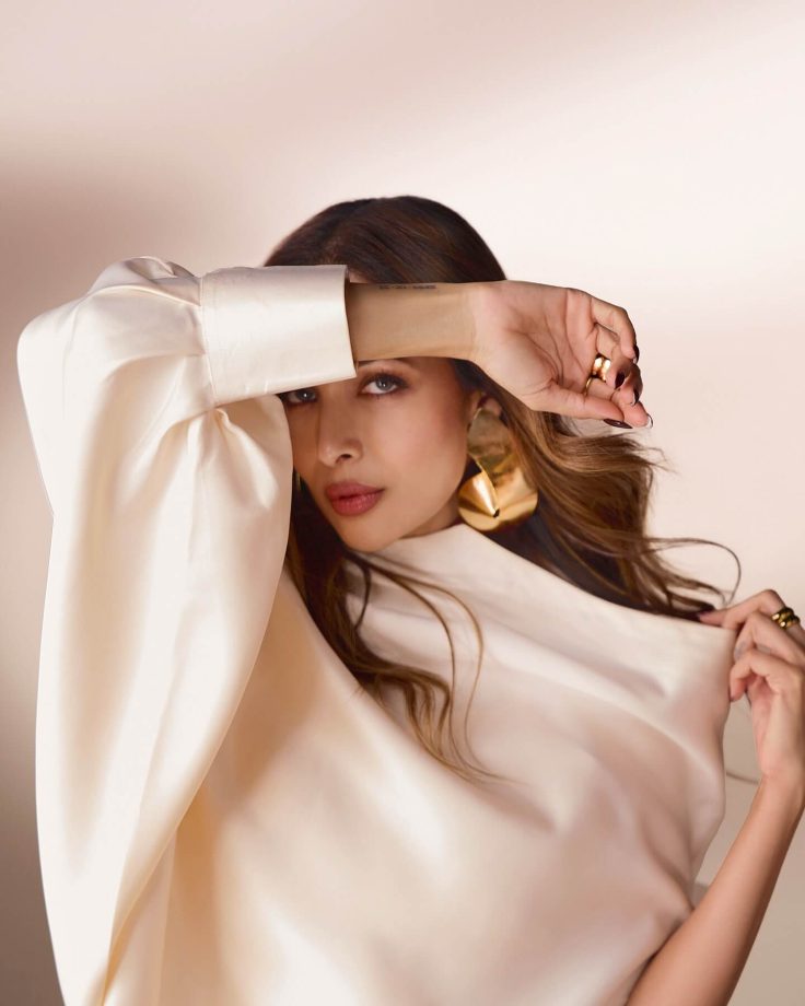 Malaika Arora Keeps it Classy in a Sleek and Stylish Off-White Dress 944179