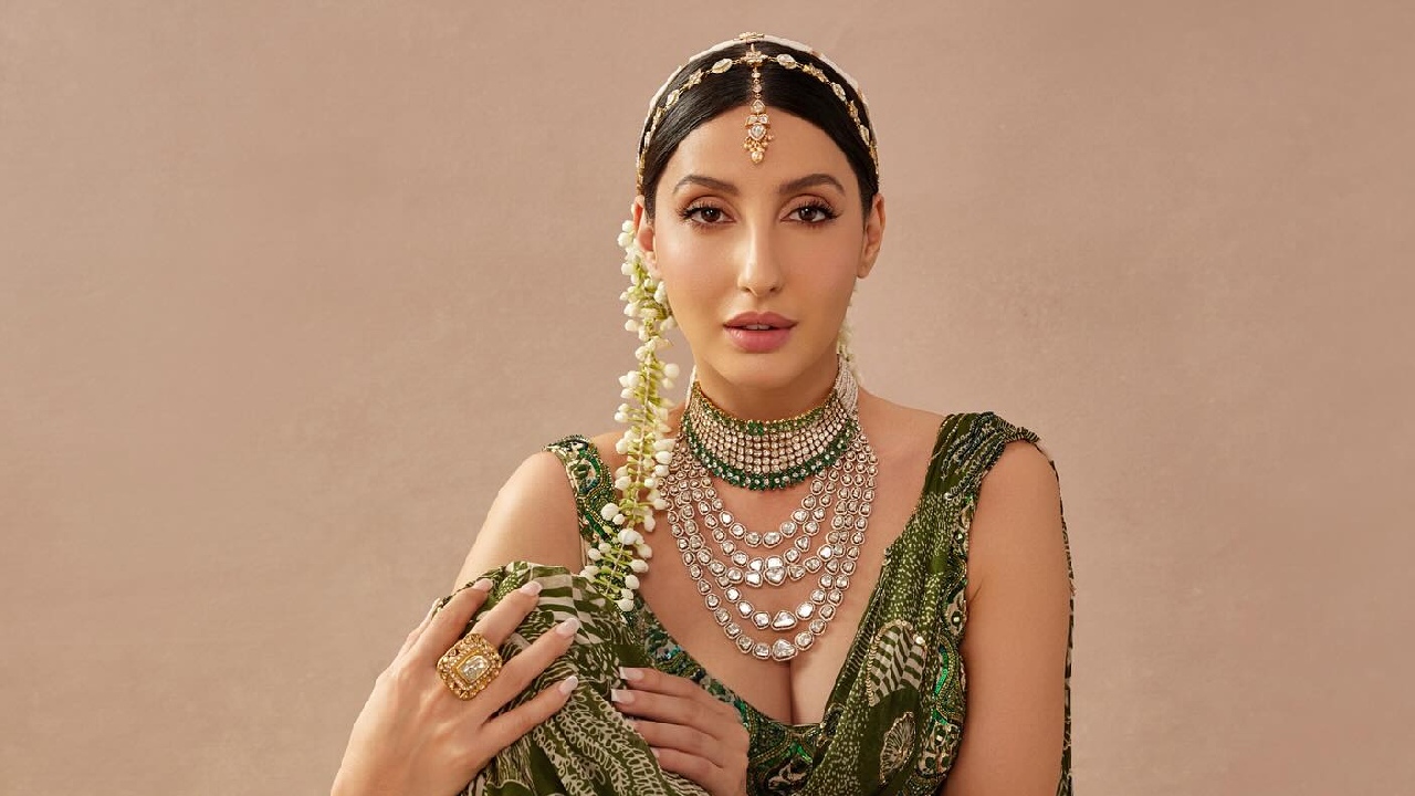 Nora Fatehi Stuns in Black Olive Saree with a Regal Twist 943992