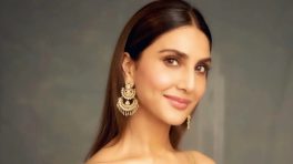 Vaani Kapoor in a Creamy White Dress with Golden Detailing