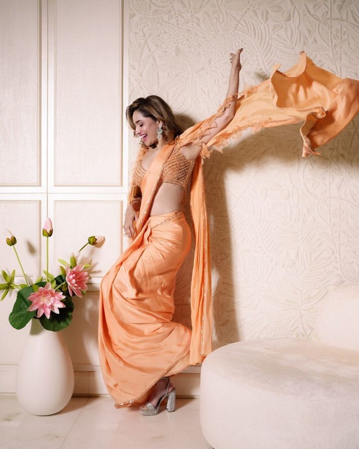 Ankita Lokhande Looks Ethereal in Dreamy Orange Ruffled Saree Look 947037