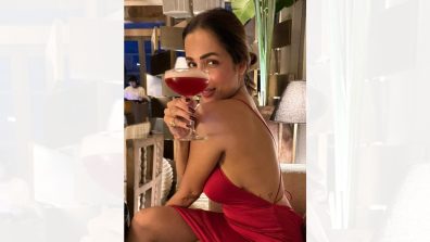 Malaika Arora’s Killer Curves Shine In Sultry Red Satin Backless Gown – See Pics