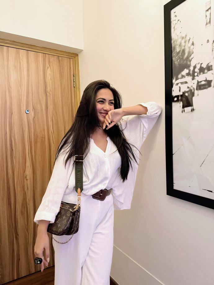 Reem Sameer Shaikh Keeps It Cool in All-White with Luxe Brown Accents 959121