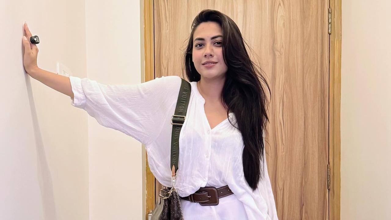 Reem Sameer Shaikh Keeps It Cool in All-White with Luxe Brown Accents 959122