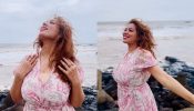 TMKOC's Munmun Dutta Embraces Monsoon Bliss In Floral Dress On Serene Beach Day 955587