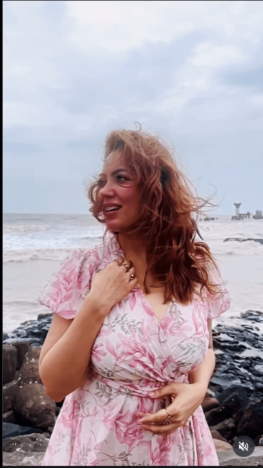 TMKOC's Munmun Dutta Embraces Monsoon Bliss In Floral Dress On Serene Beach Day 955582