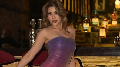 Nikki Tamboli Radiates Glamour in a Sunset-Hued Sequin Dress